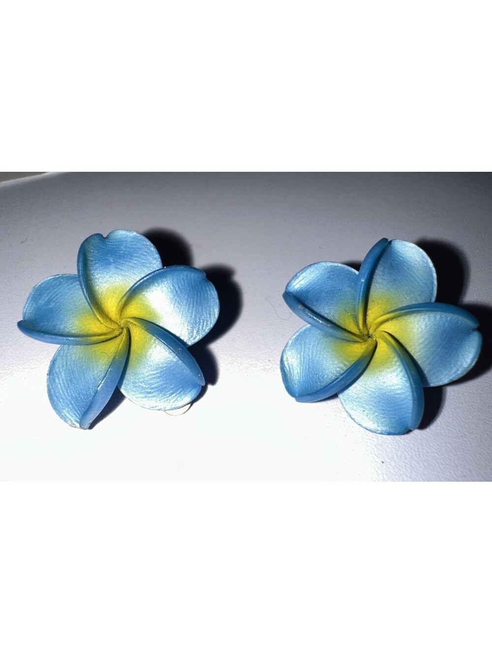 Blue Plumeria Flower Clip-on Earrings Light Blue